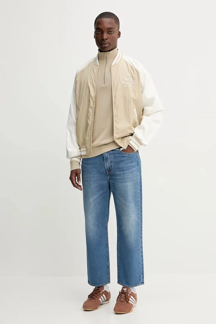Tommy Jeans Яке бомбър в бежово преходен модел DM0DM21668