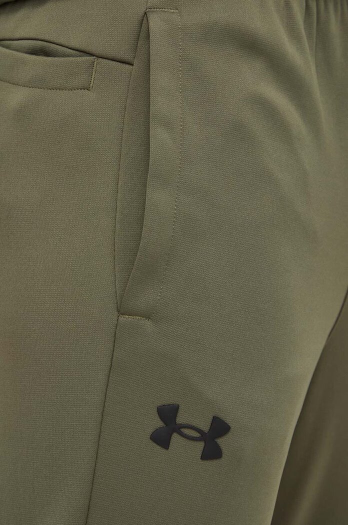 Under Armour Спортен панталон Fleece в зелено с изчистен дизайн