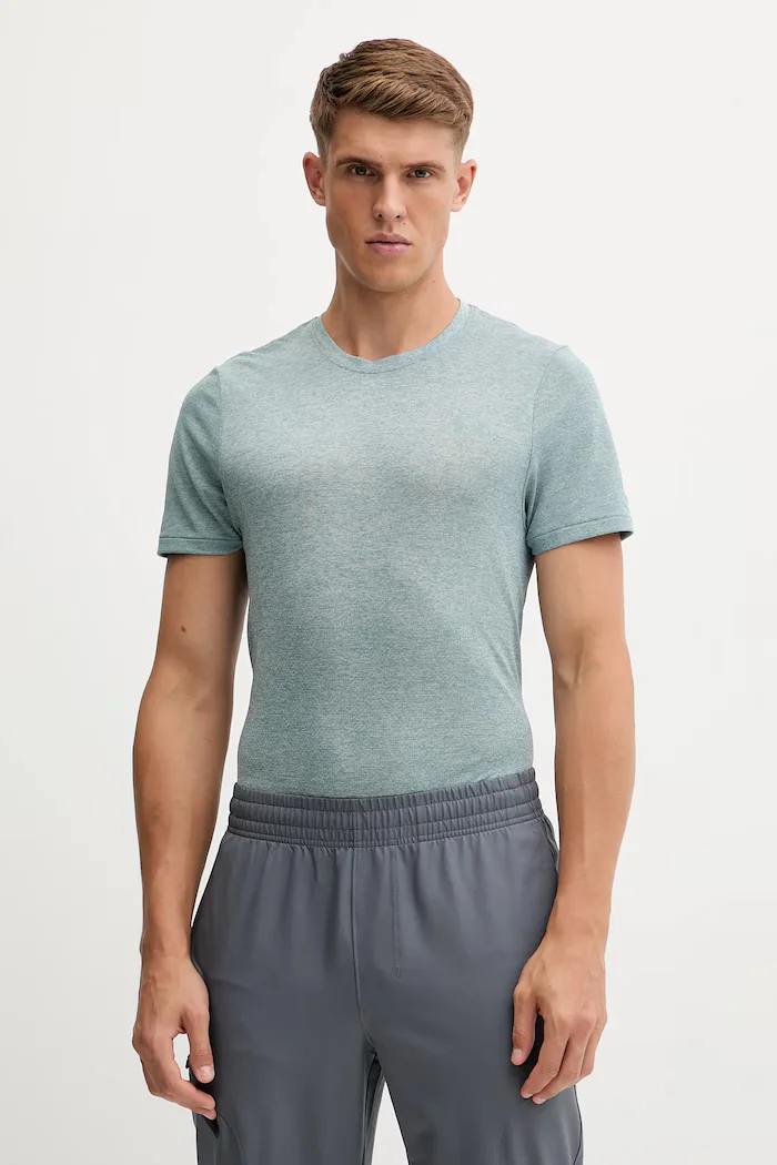Under Armour Тениска за бягане Seamless Stride в зелено с десен 1375692