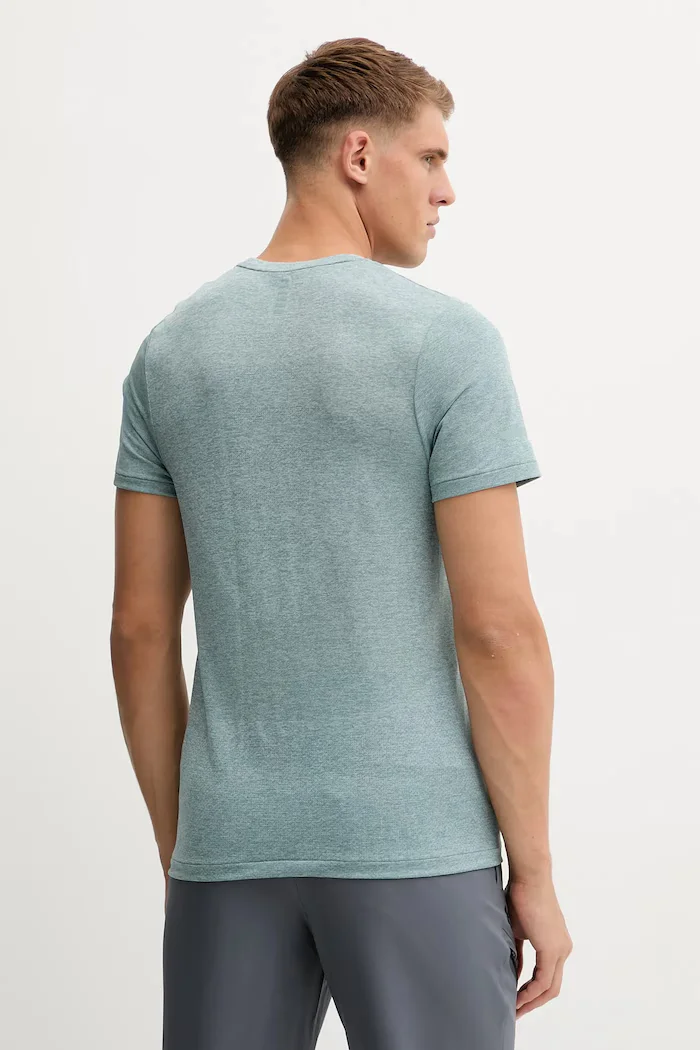Under Armour Тениска за бягане Seamless Stride в зелено с десен 1375692