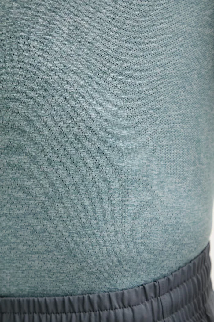 Under Armour Тениска за бягане Seamless Stride в зелено с десен 1375692