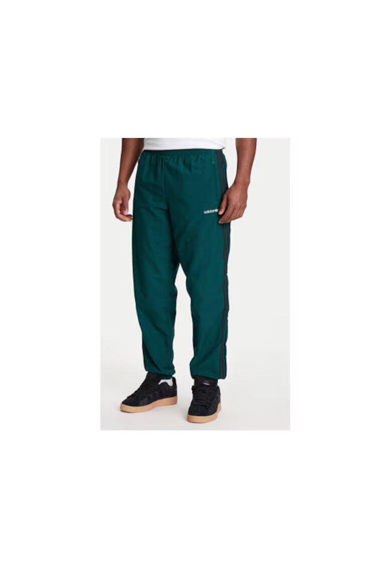 adidas Лайфстайл долнище на анцуг с джобове с цип