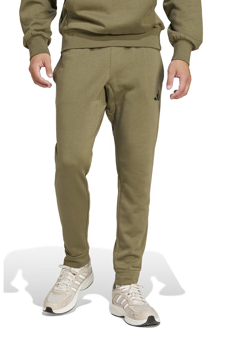 adidas Sportswear Скосен спортен панталон FeelCozy с връзка - Черен/Зелени аспержи