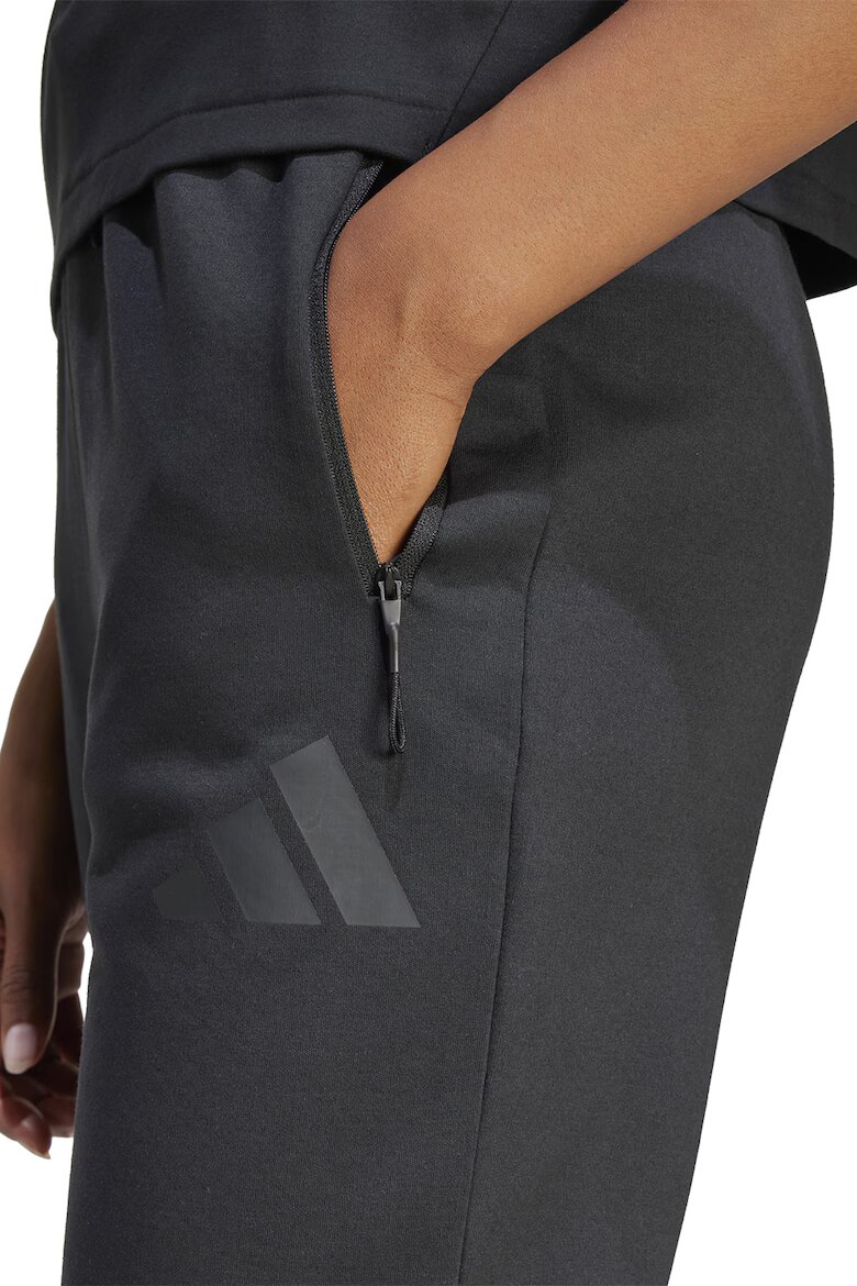 adidas Sportswear Спортен панталон Z.N.E. с джобове с цип Черен