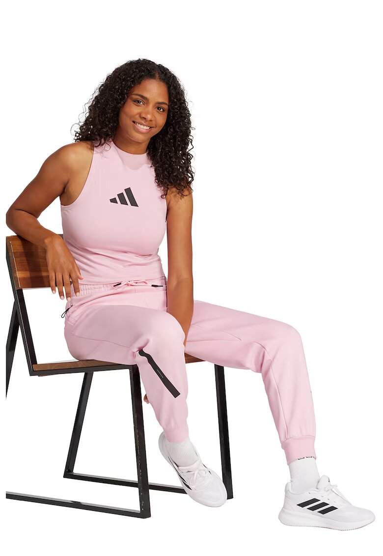 adidas Sportswear Спортен панталон Z.N.E. с джобове с цип - Черен/Пастелнорозов