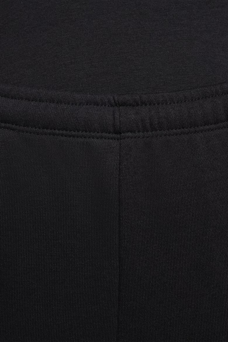 Nike Спортен панталон с памук и странични джобове Черен