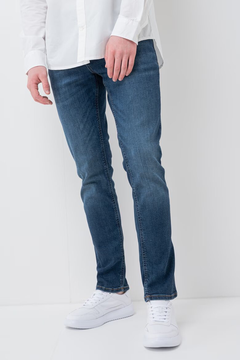 Tommy Jeans Слим дънки със захабен ефект Тъмносин
