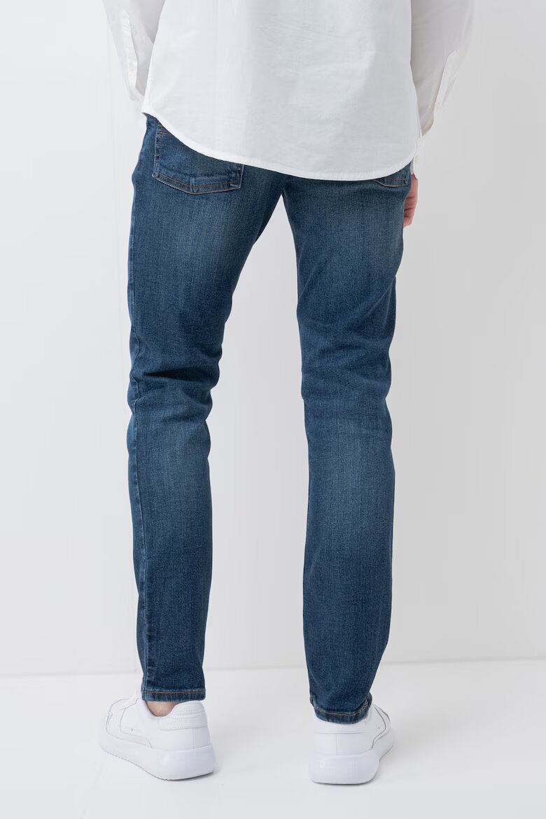 Tommy Jeans Слим дънки със захабен ефект Тъмносин