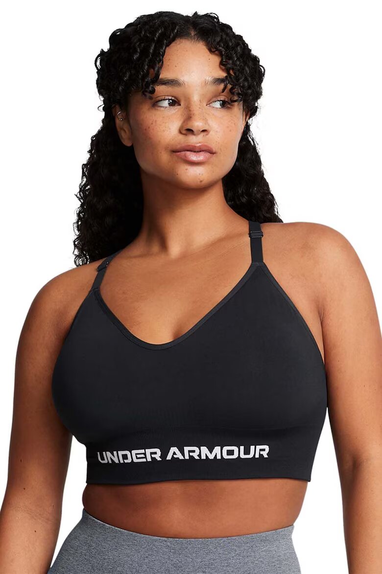 Under Armour Безшевно фитнес бюстие Vanish с лого