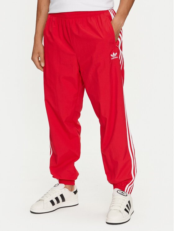 adidas Долнище анцуг Adicolor Woven Firebird IT2498 Червен Regular Fit