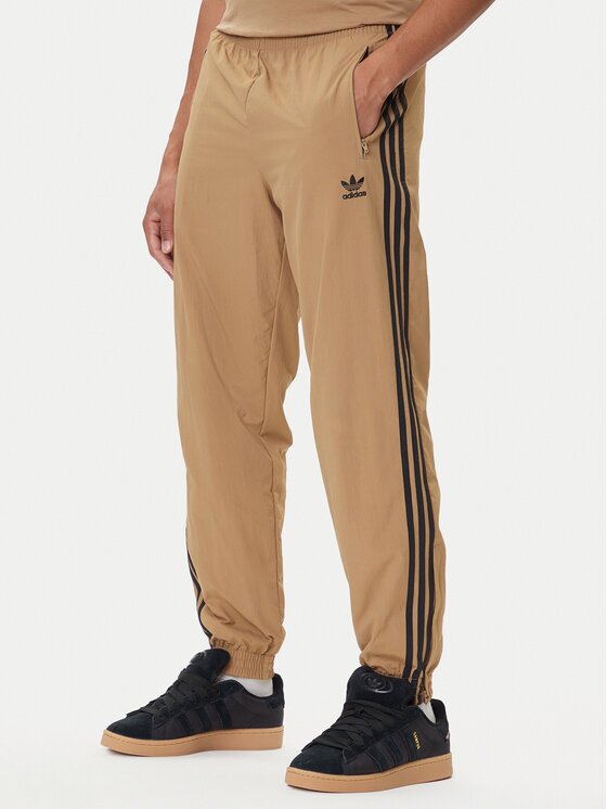 adidas Долнище анцуг adicolor Woven Firebird JY1339 Бежов Regular Fit