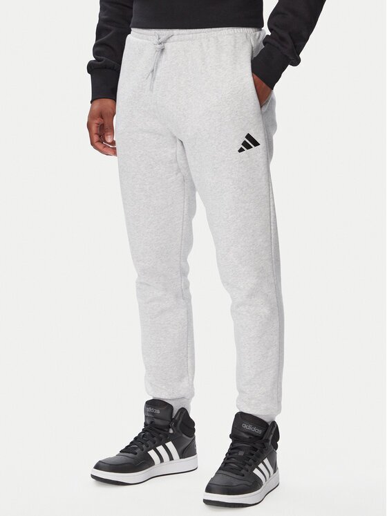 adidas Долнище анцуг Essentials Feelcozy Fleece JE3819 Светлосив Regular Fit
