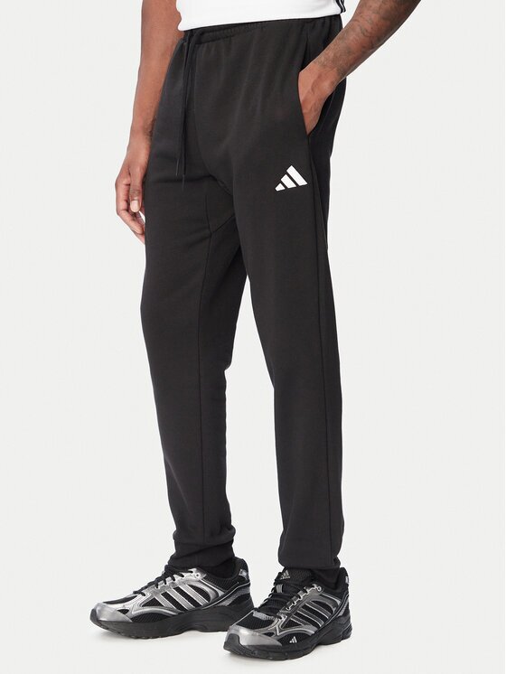 adidas Долнище анцуг Essentials Feelcozy JE3815 Черен Regular Fit