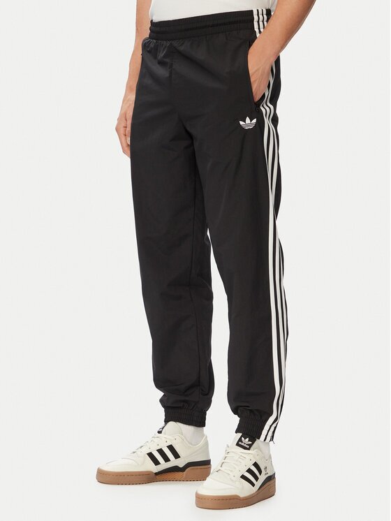 adidas Долнище анцуг Firebird Woven KE1371 Черен Regular Fit