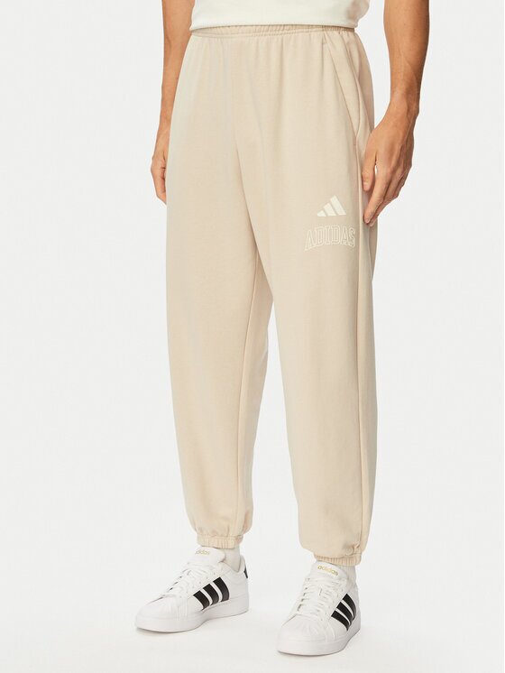 adidas Долнище анцуг Seasonal Essentials Collegiate French Terry Cuffed KF4265 Regular Fit