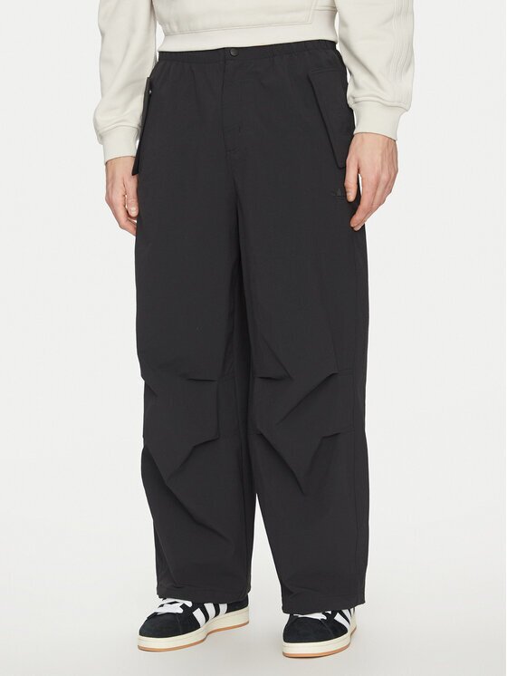 adidas Текстилни панталони Premium Essentials Utility Parachute JD2111 Черен Loose Fit